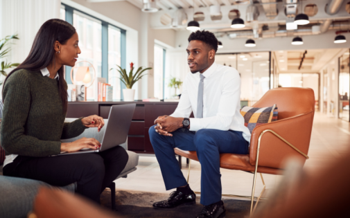 A man talking to a woman about selecting their recommenders