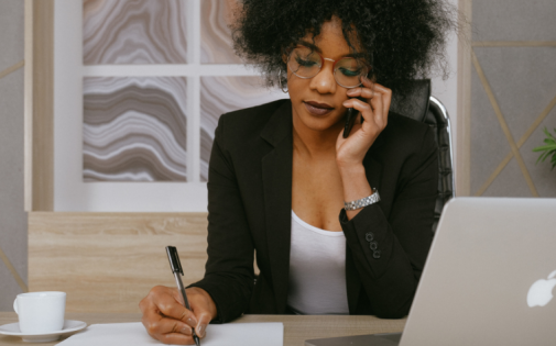 Woman on the phone deals with MBA rejection