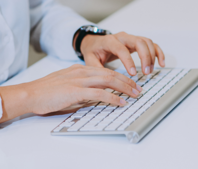 A person writing an MBA Essay